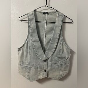Striped blue and white faded vest